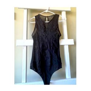 Body suit with has flowers embroidered